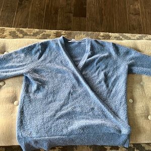 Blue sweater never been worn but doesn’t have the tags.
